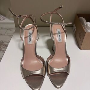 Like new Steve Madden Gold size 10